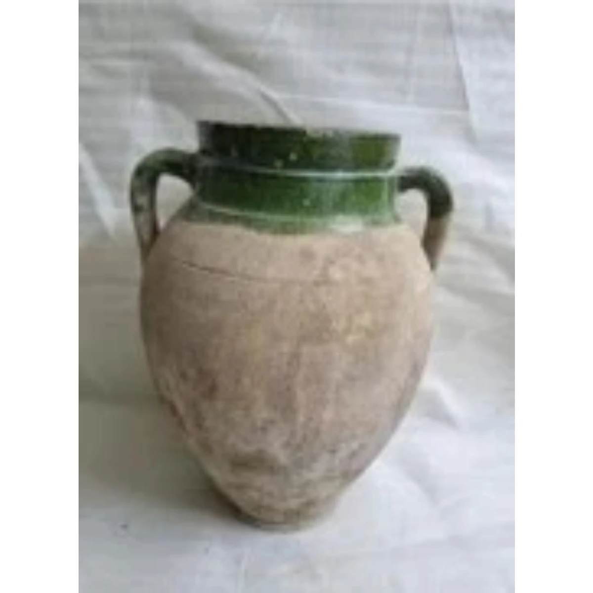 Partly glazed green and beige terracotta pot