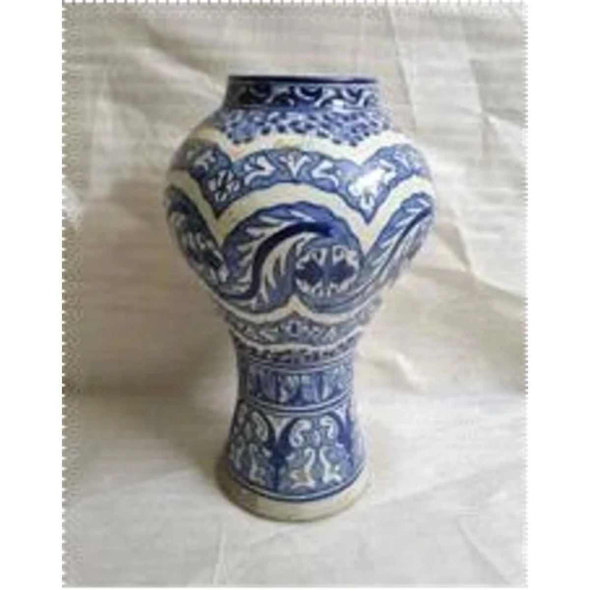 blue and white vase with intricate patterns