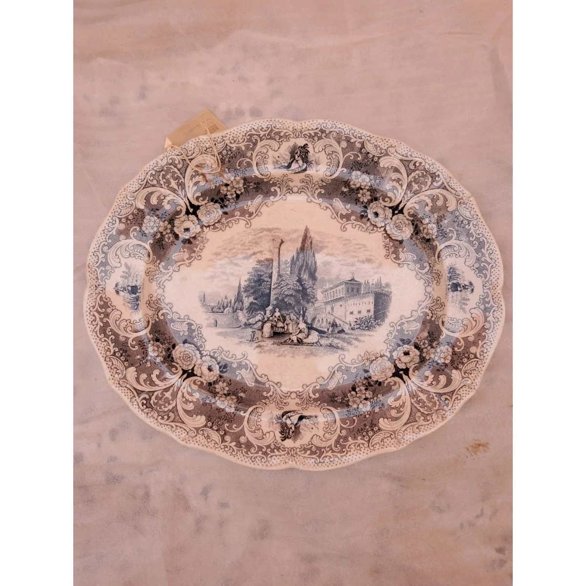 Grisaille, blue and white faience oval dish