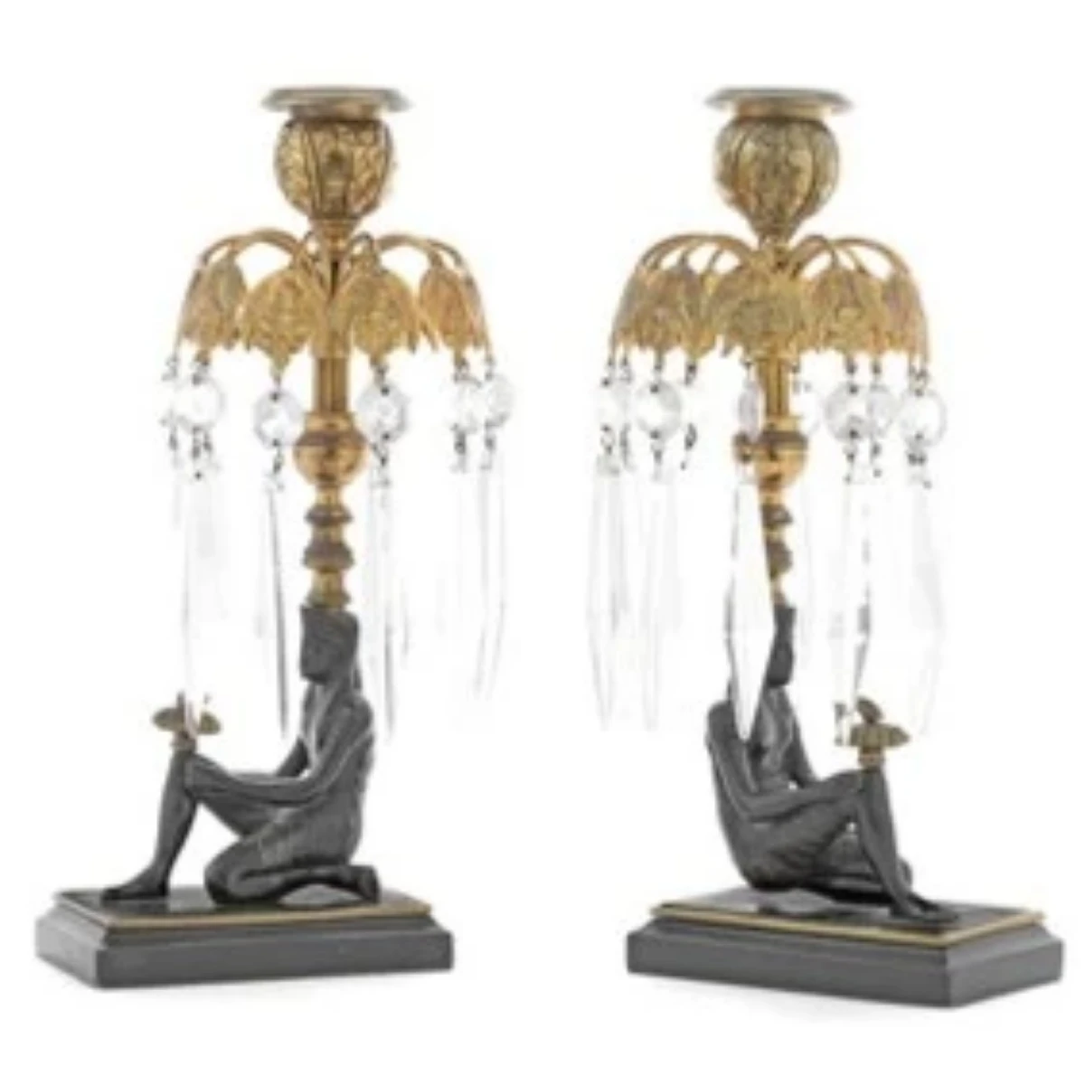 A pair of Regency gilt and antique bronze candlesticks