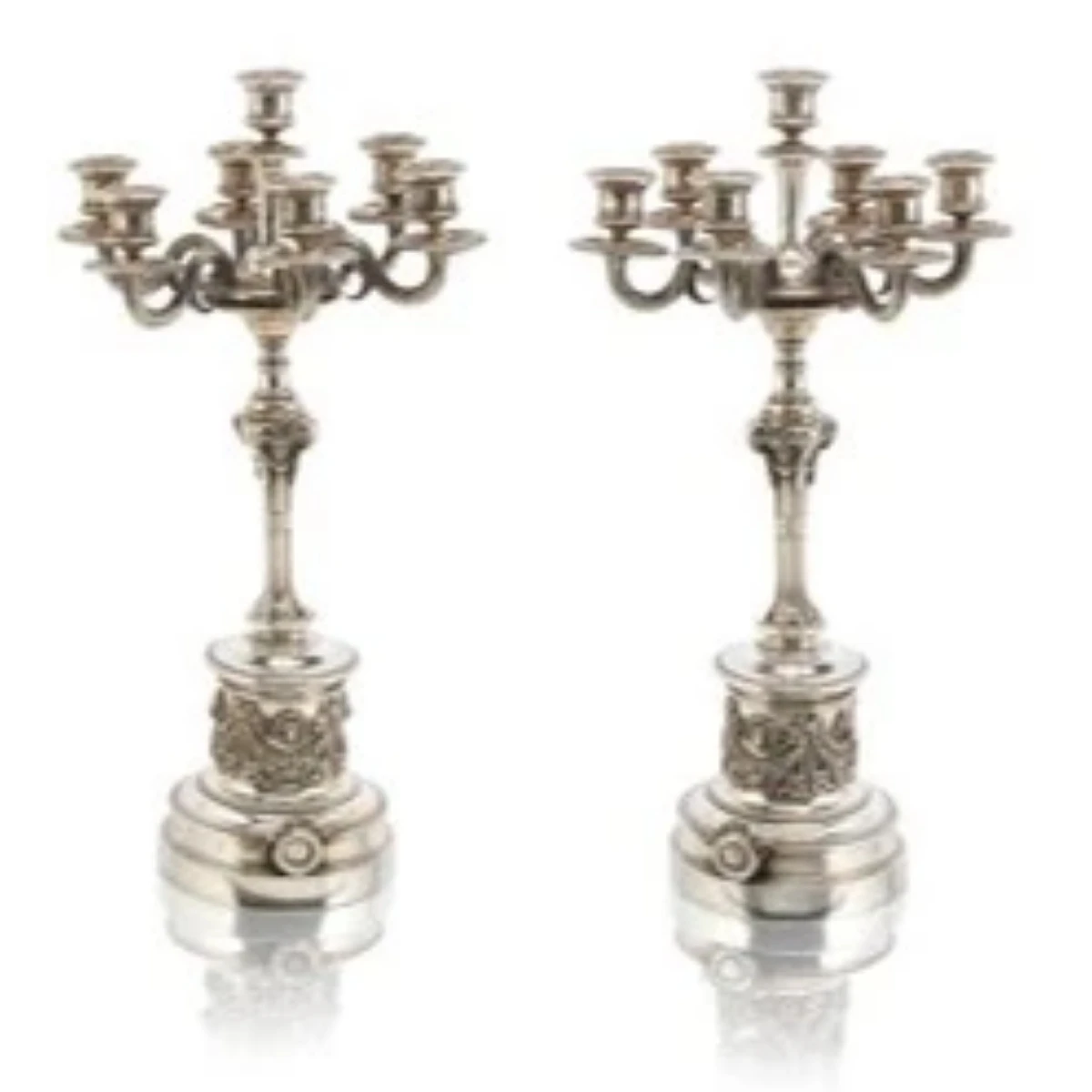 A pair of Austro-Hungarian silver seven light candlesticks