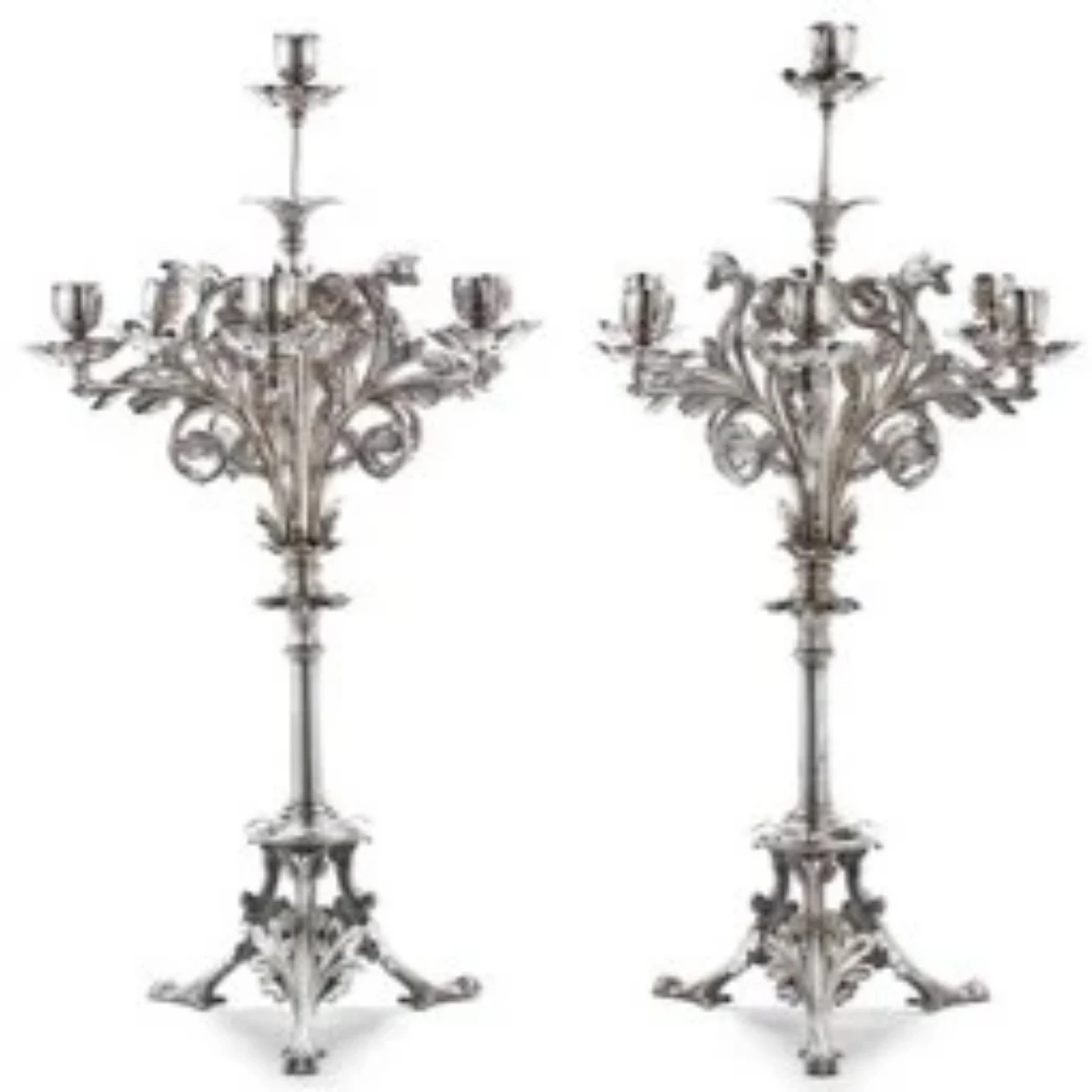 A pair of late 19th-century, silver-gilt seven light candle labra