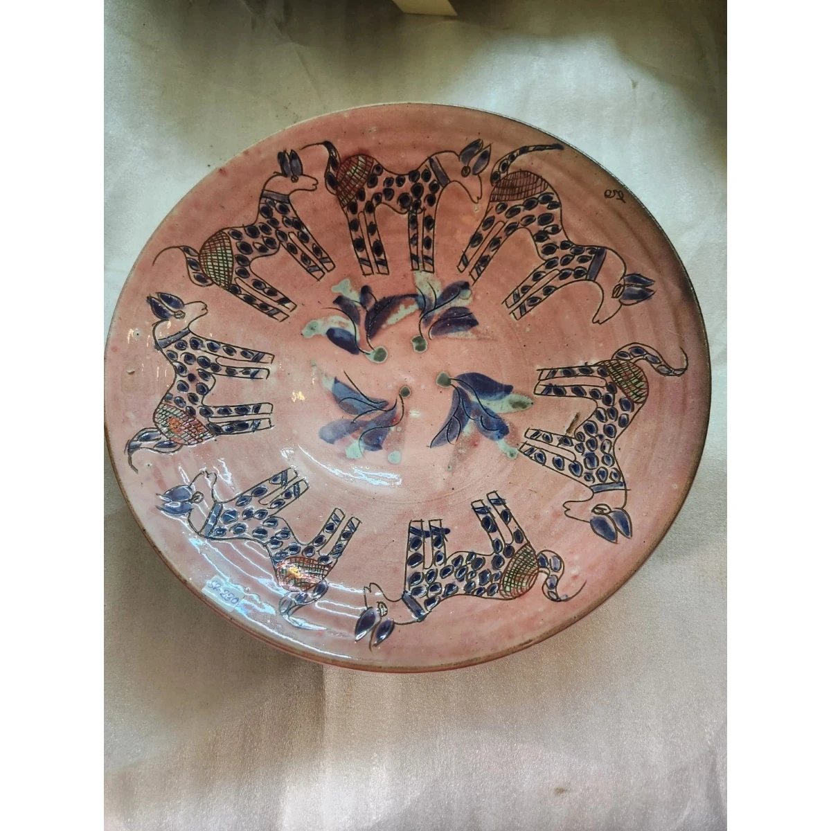 Pink lusterware ceramic plate