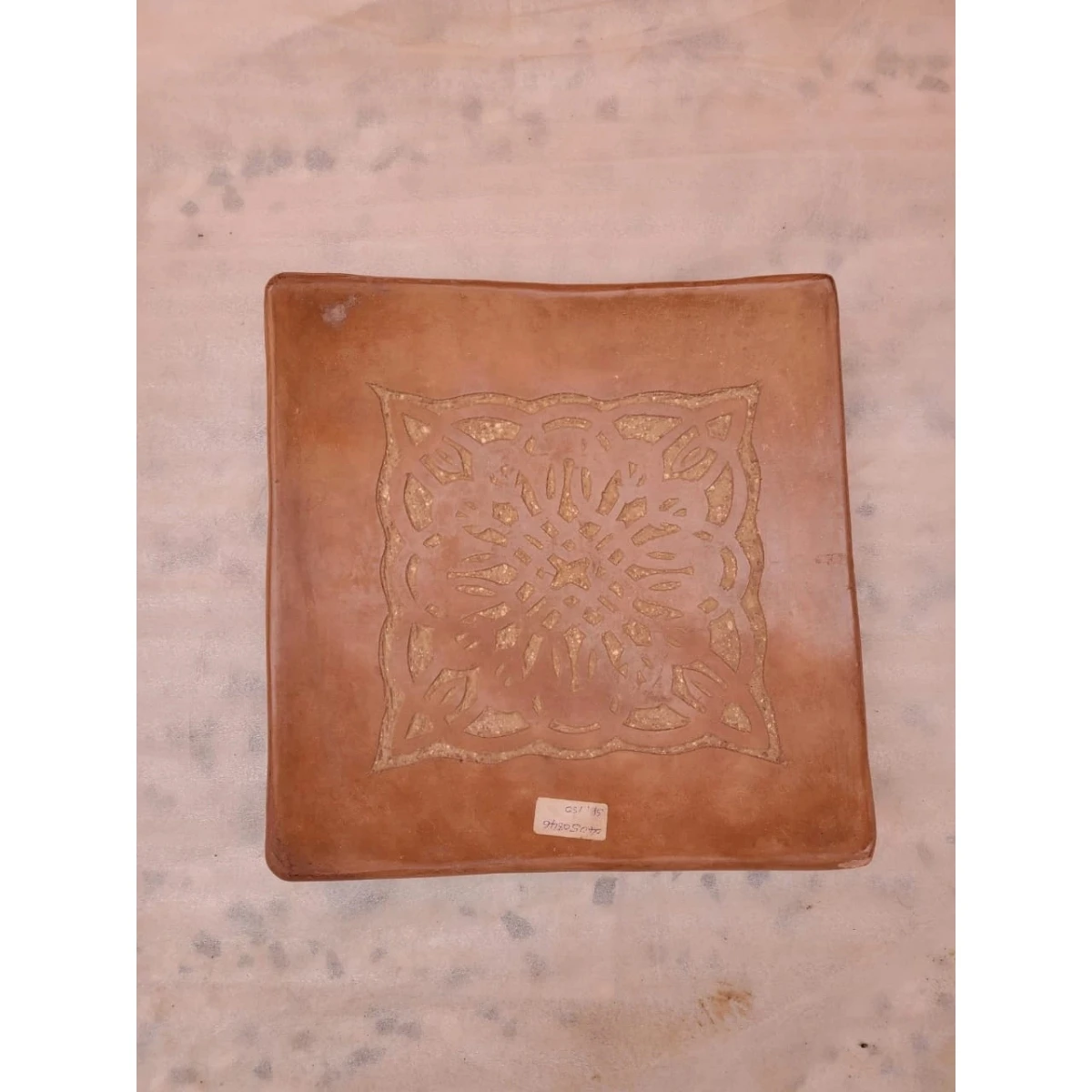 A earth color tadlack finished square ceramic plate